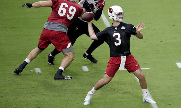 Arizona Cardinals quarterback Josh Rosen (3) throws during the first day of NFL football training c...