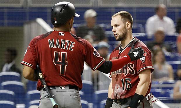 D-backs option Chris Owings as Andrew Chafin returns