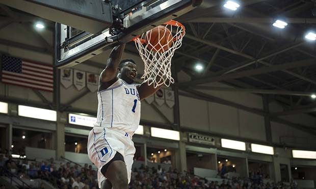 Duke's Zion Williamson (1) dunks against Toronto during a college basketball exhibition game in Mis...