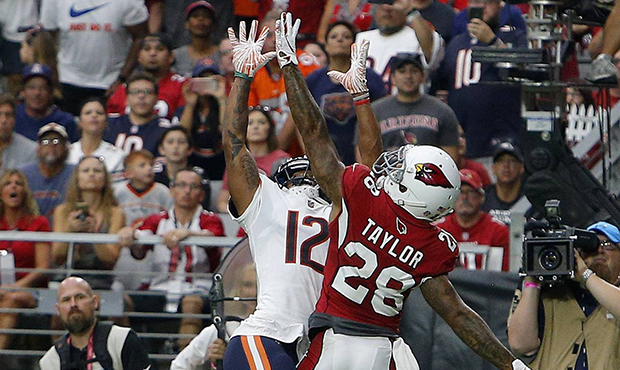 Arizona Cardinals defensive back Jamar Taylor (28) defends against a pass intended for Chicago Bear...