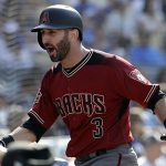 Arizona Diamondbacks' Daniel Descalso celebrates after hitting a solo home run against the Los Angeles Dodgers during the ninth inning of a baseball game Sunday, Sept. 2, 2018, in Los Angeles. (AP Photo/Marcio Jose Sanchez)