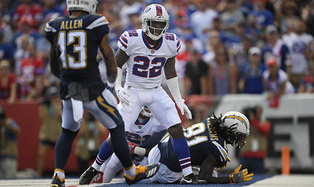Buffalo Bills' Vontae Davis, center, gets up after Los Angeles Chargers' Mike Williams, right, scor...