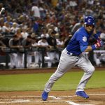 Chicago Cubs' Ben Zobrist throws his bat after hitting a ground ball against the Arizona Diamondbacks during the first inning of a baseball game Monday, Sept. 17, 2018, in Phoenix. (AP Photo/Ross D. Franklin)