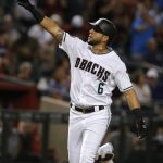 Arizona Diamondbacks' David Peralta reacts after hitting a two-run home run against the Colorado Rockies in the first inning during a baseball game, Friday, Sept. 21, 2018, in Phoenix. (AP Photo/Rick Scuteri)