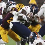 UTSA quarterback D.J. Gillins (15) is sacked by Arizona State defensive back Chase Lucas (24) during the first half of an NCAA college football game, Saturday, Sept. 1, 2018, in Tempe, Ariz. (AP Photo/Ralph Freso)