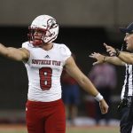 Southern Utah quarterback Chris Helbig (8) reacts after getting hit late by an Arizona defenseman in the first half during an NCAA college football game, Saturday, Sept. 15, 2018, in Tucson, Ariz. (AP Photo/Rick Scuteri)