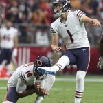 Chicago Bears kicker Cody Parkey (1) boots a field goal against the Arizona Cardinals with the help of holder Pat O'Donnell (16) during the second half of an NFL football game, Sunday, Sept. 23, 2018, in Glendale, Ariz. (AP Photo/Ralph Freso)