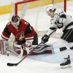 Arizona Coyotes goalie Hunter Miska (1) makes a save on a shot by Los Angeles Kings right wing Tyler Toffoli, right, during the third period of an NHL preseason hockey game Tuesday, Sept. 18, 2018, in Glendale, Ariz. (AP Photo/Ross D. Franklin)
