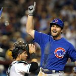 Chicago Cubs' Daniel Murphy celebrates after hitting a two-run home run against the Arizona Diamondbacks in the second inning during a baseball game, Tuesday, Sept. 18, 2018, in Phoenix. (AP Photo/Rick Scuteri)