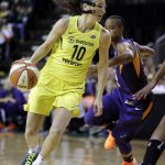 Seattle Storm's Sue Bird (10) drives past Phoenix Mercury's Yvonne Turner during the first half of Game 5 of a WNBA basketball playoffs semifinal, Tuesday, Sept. 4, 2018, in Seattle. (AP Photo/Elaine Thompson)