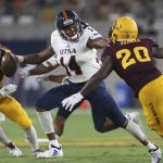 UTSA quarterback Cordale Grundy (14) tries to avoid being sacked by Arizona State linebacker Khaylan Thomas (20) during the second half of an NCAA college football game, Saturday, Sept. 1, 2018, in Tempe, Ariz. (AP Photo/Ralph Freso)