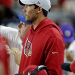 Arizona Cardinals quarterback Sam Bradford watches from the bench during the second half of an NFL football game against the Seattle Seahawks, Sunday, Sept. 30, 2018, in Glendale, Ariz. (AP Photo/Ross D. Franklin)