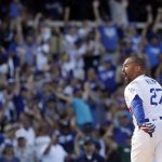 Los Angeles Dodgers' Matt Kemp celebrates after driving in two-runs with a double during the ninth inning of a baseball game against the Arizona Diamondbacks Sunday, Sept. 2, 2018, in Los Angeles. Los Angeles won the game 3-2. (AP Photo/Marcio Jose Sanchez)
