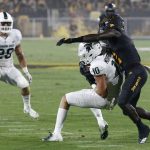 Michigan State safety Matt Morrissey (10) intercepts a pass intended for Arizona State wide receiver Brandon Aiyuk (2) as Michigan State linebacker Jon Reschke (28) watches during the first half of an NCAA college football game Saturday, Sept. 8, 2018, in Tempe, Ariz. (AP Photo/Ross D. Franklin)