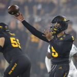 Arizona State quarterback Manny Wilkins (5) throws a pass against Michigan State during the first half of an NCAA college football game Saturday, Sept. 8, 2018, in Tempe, Ariz. (AP Photo/Ross D. Franklin)