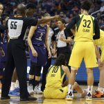 Seattle Storm guard Sue Bird (10) sits on the court after taking an elbow to the face during the first half of Game 4 of the team's WNBA basketball playoffs semifinal against the Phoenix Mercury, Sunday, Sept. 2, 2018, in Phoenix. Bird left the game. (AP Photo/Ralph Freso)