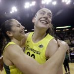 Seattle Storm's Breanna Stewart, right, is embraced by Sue Bird after the Storm defeated the Phoenix Mercury 94-84 during Game 5 of a WNBA basketball playoff semifinal, Tuesday, Sept. 4, 2018, in Seattle. The Storm advanced to the WNBA finals. (AP Photo/Elaine Thompson)
