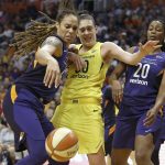 Seattle Storm forward Breanna Stewart, center, and Phoenix Mercury's Brittney Griner (42) and Camile Little (20) vie for the ball during the second half of Game 4 of a WNBA basketball playoffs semifinal, Sunday, Sept. 2, 2018, in Phoenix. (AP Photo/Ralph Freso)
