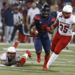 Arizona wide receiver Shun Brown (6) runs away from Southern Utah safety Mike Sims and Chinedu Ahanonu (35) and scores a touchdown in the second half during an NCAA college football game, Saturday, Sept. 15, 2018, in Tucson, Ariz. (AP Photo/Rick Scuteri)