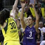 Phoenix Mercury's Diana Taurasi (3) shoots in front of Seattle Storm's Breanna Stewart (30) during the first half of Game 5 of a WNBA basketball playoffs semifinal Tuesday, Sept. 4, 2018, in Seattle. (AP Photo/Elaine Thompson)