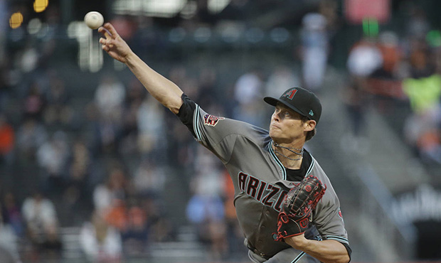 Arizona Diamondbacks starting pitcher Clay Buchholz works in the first inning of a baseball game ag...