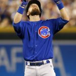 Chicago Cubs' Ben Zobrist celebrates his double against the Arizona Diamondbacks as he stands on second base during the fourth inning of a baseball game Monday, Sept. 17, 2018, in Phoenix. (AP Photo/Ross D. Franklin)