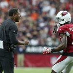 Arizona Cardinals head coach Steve Wilks, left, shouts instructions as Patrick Peterson (21) listens during the second half of an NFL football game against the Chicago Bears, Sunday, Sept. 23, 2018, in Glendale, Ariz. (AP Photo/Ralph Freso)