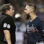 Atlanta Braves' Ender Inciarte, right, argues with home plate umpire Doug Eddings after striking out against the Arizona Diamondbacks during the fourth inning of a baseball game, Friday, Sept. 7, 2018, in Phoenix. (AP Photo/Ralph Freso)