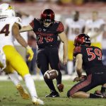 San Diego State place kicker John Baron II, center, kicks a 54-yard field goal during the second half of an NCAA college football game against Arizona State Saturday, Sept. 15, 2018, in San Diego. (AP Photo/Gregory Bull)