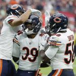 Chicago Bears defensive back Eddie Jackson (39) celebrates his interception against the Arizona Cardinals with Adrian Amos, left, and Roquan Smith (58) during the second half of an NFL football game, Sunday, Sept. 23, 2018, in Glendale, Ariz. (AP Photo/Rick Scuteri)