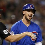 Chicago Cubs' Kris Bryant, right, argues a third strike call against him by Ted Barrett, left, during the third inning of a baseball game against the Arizona Diamondbacks, Monday, Sept. 17, 2018, in Phoenix. (AP Photo/Ross D. Franklin)