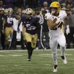 Arizona State defensive back Chase Lucas, right, runs the ball after intercepting a pass intended for Washington wide receiver Andre Baccellia (5) during the first half of an NCAA college football game Saturday, Sept. 22, 2018, in Seattle. (AP Photo/Ted S. Warren)