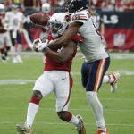 Arizona Cardinals defensive back Bene' Benwikere, left, breaks up a pass intended for Chicago Bears wide receiver Allen Robinson, right, during the second half of an NFL football game, Sunday, Sept. 23, 2018, in Glendale, Ariz. (AP Photo/Rick Scuteri)