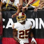 Washington Redskins running back Chris Thompson (25) celebrates his touchdown against the Arizona Cardinals during the first half of an NFL football game, Sunday, Sept. 9, 2018, in Glendale, Ariz. (AP Photo/Rick Scuteri)