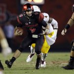 San Diego State quarterback Ryan Agnew runs with the ball during the first half of an NCAA college football game against Arizona State, Saturday, Sept. 15, 2018, in San Diego. (AP Photo/Gregory Bull)