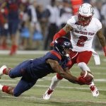 Arizona wide receiver Devaughn Cooper makes the catch in front of Southern Utah safety Elijah Holt (2) in the second half during an NCAA college football game, Saturday, Sept. 15, 2018, in Tucson, Ariz. (AP Photo/Rick Scuteri)