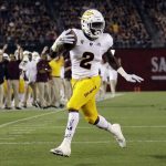 Arizona State wide receiver Brandon Aiyuk (2) reacts on his way to scoring a touchdown during the first half of an NCAA college football game against San Diego State, Saturday, Sept. 15, 2018, in San Diego. (AP Photo/Gregory Bull)