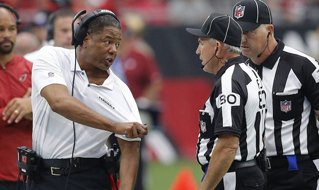Arizona Cardinals head coach Steve Wilks argues a call with referee Greg Gautreaux (80) during the ...