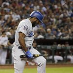 Los Angeles Dodgers' Yasiel Puig breaks his bat over his leg after flyiing out against the Arizona Diamondbacks during the fifth inning of a baseball game Wednesday, Sept. 26, 2018, in Phoenix. (AP Photo/Ross D. Franklin)