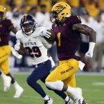 Arizona State wide receiver N'Keal Harry (1) runs to the end zone ahead of UTSA defensive back Clayton Johnson (29) on a 58-yard touchdown reception during the first half of an NCAA college football game, Saturday, Sept. 1, 2018, in Tempe, Ariz. (AP Photo/Ralph Freso)