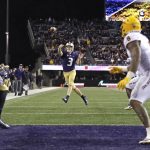 Washington quarterback Jake Browning (3) makes a touchdown pass to tight end Cade Otton (not shown) during the second half of an NCAA college football game against Arizona State, Saturday, Sept. 22, 2018, in Seattle. Washington won 27-20. (AP Photo/Ted S. Warren)