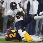 UTSA running back Jalen Rhodes (5) is up-ended by Arizona State defensive back Chase Lucas during the first half of an NCAA college football game, Saturday, Sept. 1, 2018, in Tempe, Ariz. (AP Photo/Ralph Freso)