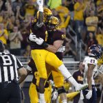 Arizona State wide receiver Terrell Chatman (19) celebrates with teammate Alex Losoya (56) after Chatman's 11-yard touchdown catch against UTSA during the first half of an NCAA college football game, Saturday, Sept. 1, 2018, in Tempe, Ariz. (AP Photo/Ralph Freso)