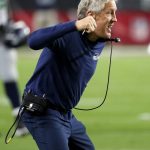 Seattle Seahawks head coach Pete Carroll cheers during the first half of an NFL football game against the Arizona Cardinals, Sunday, Sept. 30, 2018, in Glendale, Ariz. (AP Photo/Rick Scuteri)