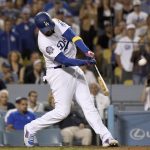 Los Angeles Dodgers' Matt Kemp hits a three-run homer in the eighth inning of a baseball game against the Arizona Diamondbacks, Saturday, Sept. 1, 2018, in Los Angeles. (AP Photo/Michael Owen Baker)