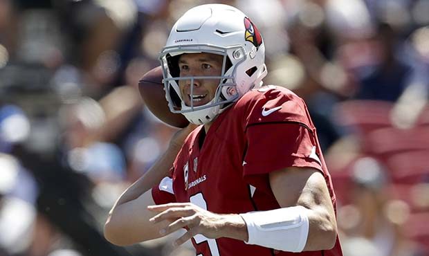 Arizona Cardinals quarterback Sam Bradford passes against the Los Angeles Rams during the first hal...