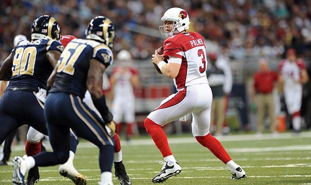 Arizona Cardinals quarterback Carson Palmer drops back to pass during the second quarter of an NFL ...