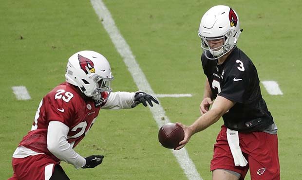 Arizona Cardinals quarterback Josh Rosen hands off to Chase Edmonds (29) during the first day of th...