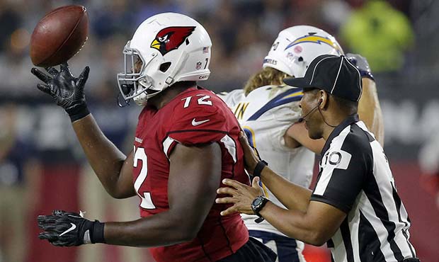 Arizona Cardinals defensive tackle Olsen Pierre (72) celebrates a fumble recovery against the Los Angeles Chargers during the first half of a preseason NFL football game, Saturday, Aug. 11, 2018, in Glendale, Ariz. (AP Photo/Ross D. Franklin)