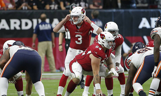 Arizona Cardinals quarterback Josh Rosen (3) gives out signals as he enters an NFL football game ag...